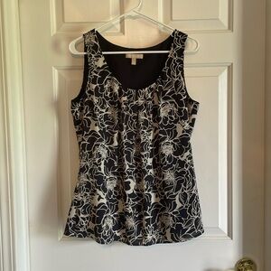 Sleeveless Navy and Cream shift top.